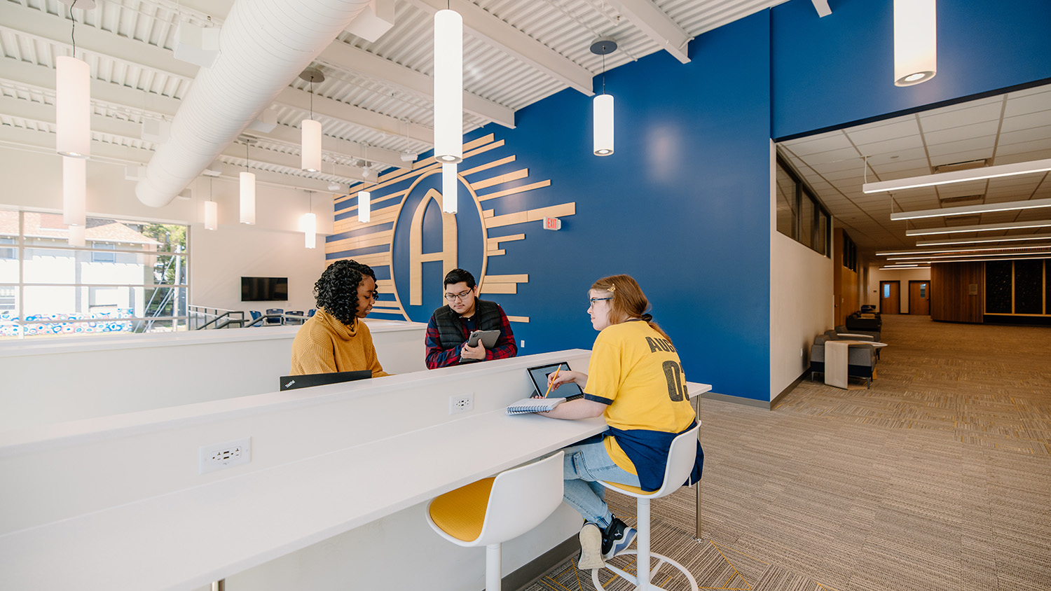 Three students studying in Lindberg