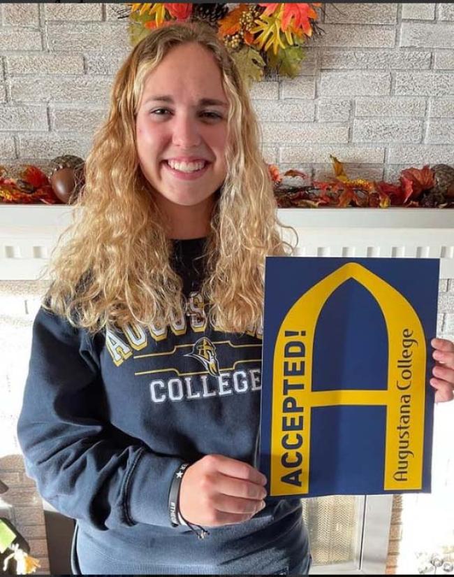 student with acceptance packet