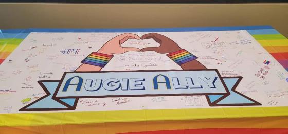 poster signed by augie allies to the LGBTQIA+ community