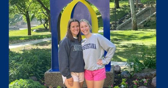 Adele smiling with a friend on Augustana College