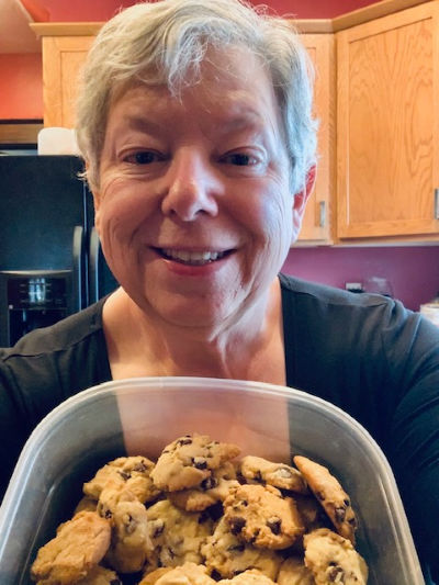Marsha holding chocolate chips cookies