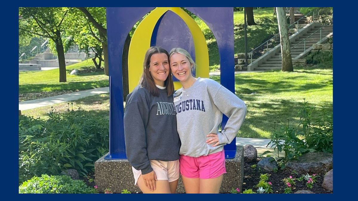 Adele smiling with a friend on Augustana College