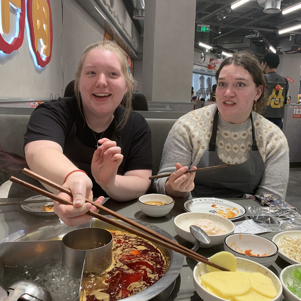 Two students try hotpot