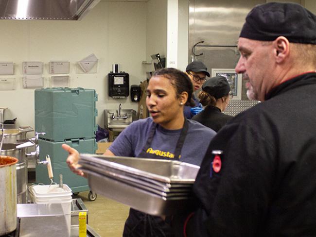 Nadia Ayensah and Chef Martin Fleetwood in the kitchen