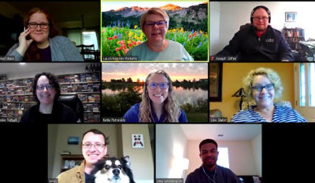 8 people on a screen smiling